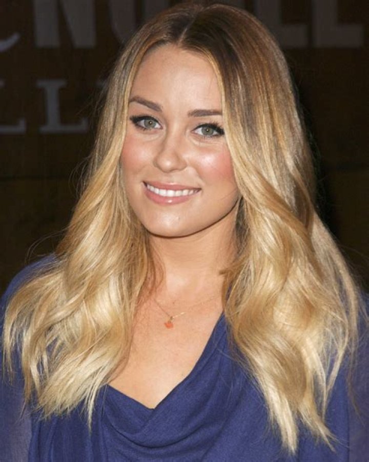 Does anyone else think Lauren Conrad looks waxy & Botoxy?