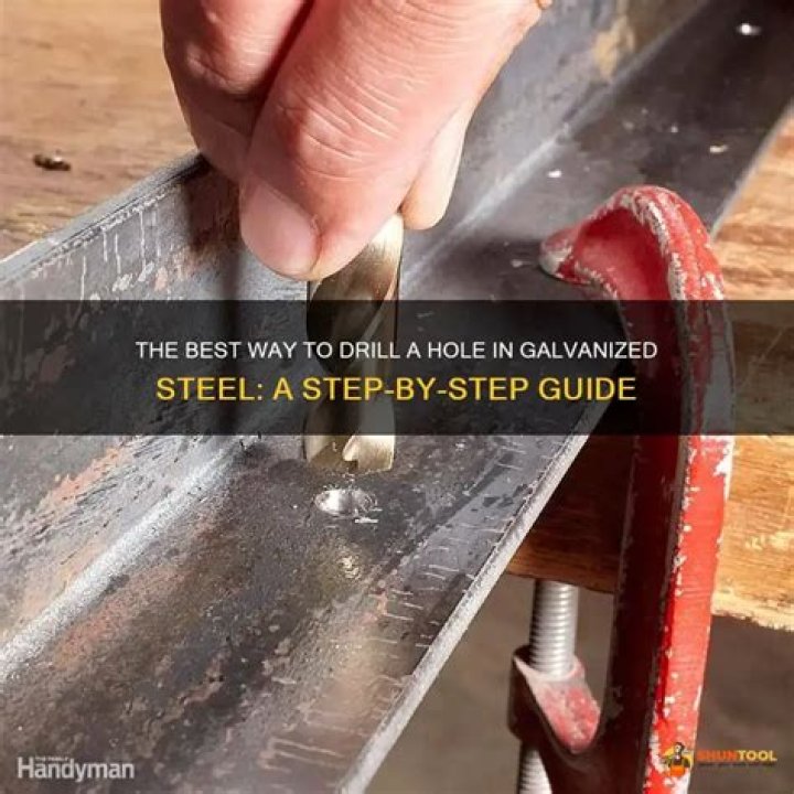 How do you drill a hole in galvanized steel pipe?