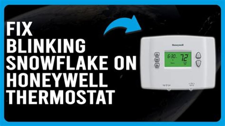 What does it mean when the snowflake is flashing on my thermostat?